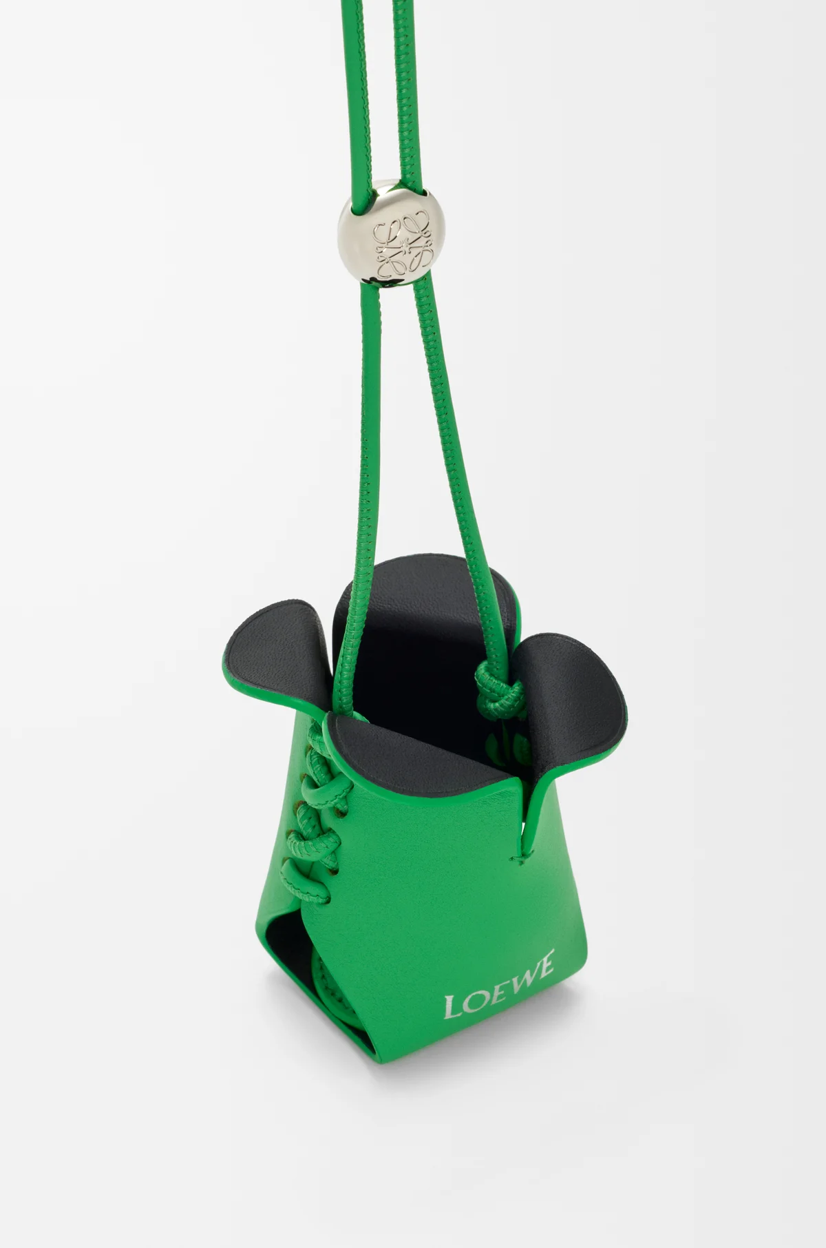 Close-up of LOEWE Dok Khoon leather charm with iconic Anagram logo