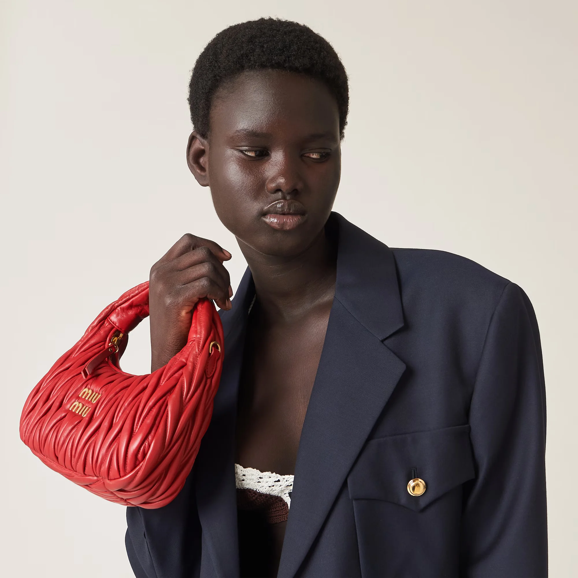 Red designer bags from Miu Miu for holidays